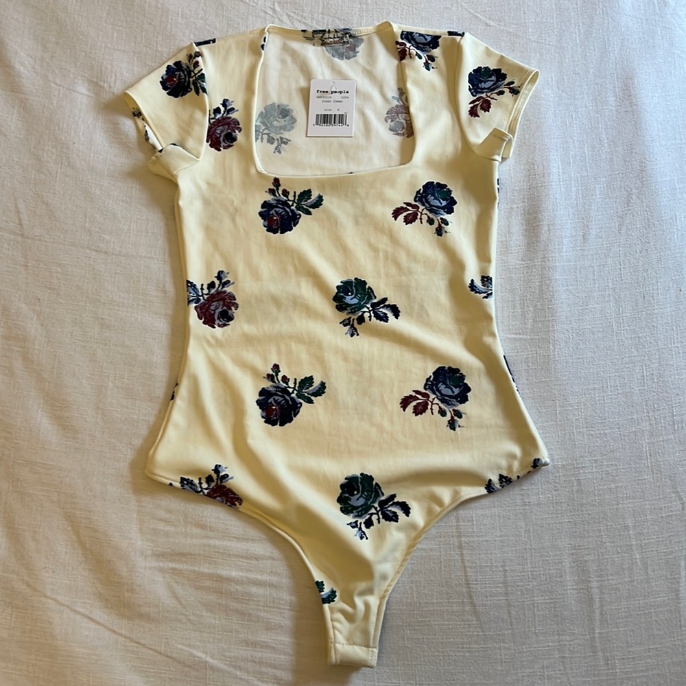 Free People NWT bodysuit. Small. Never worn.